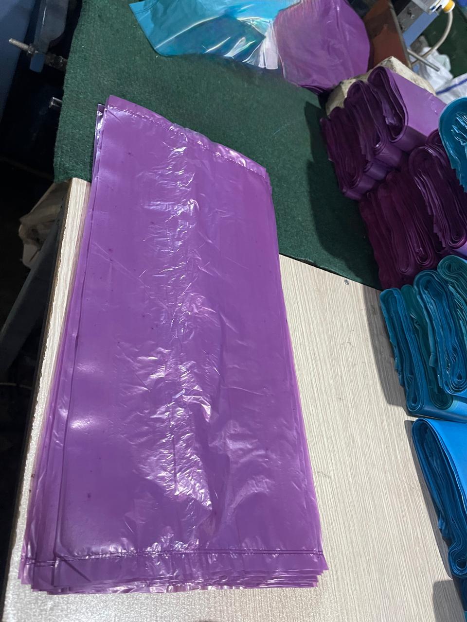 Folded purple bags