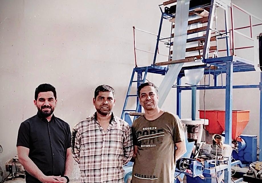 Team at the machine